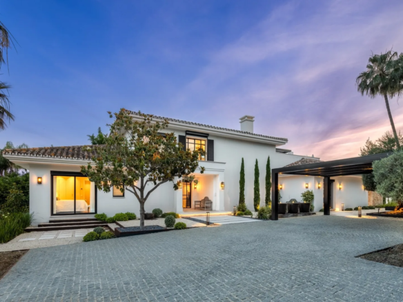 Get Your Luxury Golf Villa in Nueva Andalucía, Marbella A stunning luxury villa located in the prestigious Nueva Andalucía area, offering an exceptional real estate opportunity in Marbella's most desirable location. Key Features 5 bedrooms 5 bathrooms + 1 guest toilet 490 m² built area 1,561 m² plot size Private swimming pool Private garden Frontline golf position Recently renovated with premium finishes Entertainment level with bar Fully equipped home gym Expansive windows with natural light Covered carport for two cars Investment Advantages Prime location in Nueva Andalucía Exceptional renovation quality High-end amenities Potential for luxury rental market Impressive golf course views Pricing Sale Price just: €6,950,000 Exclusive of additional taxes and fees Location Highlights Heart of Nueva Andalucía Easy access to local amenities Stunning golf course panoramas Close to Marbella's premium services A perfect blend of luxury, design, and prime location, this Luxury Golf Villa represents an outstanding investment in Marbella's luxury real estate market.