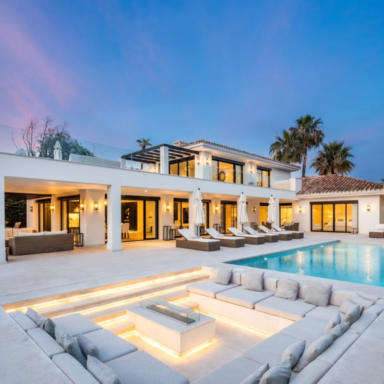 Get Your Luxury Golf Villa in Nueva Andalucía, Marbella A stunning luxury villa located in the prestigious Nueva Andalucía area, offering an exceptional real estate opportunity in Marbella's most desirable location. Key Features 5 bedrooms 5 bathrooms + 1 guest toilet 490 m² built area 1,561 m² plot size Private swimming pool Private garden Frontline golf position Recently renovated with premium finishes Entertainment level with bar Fully equipped home gym Expansive windows with natural light Covered carport for two cars Investment Advantages Prime location in Nueva Andalucía Exceptional renovation quality High-end amenities Potential for luxury rental market Impressive golf course views Pricing Sale Price just: €6,950,000 Exclusive of additional taxes and fees Location Highlights Heart of Nueva Andalucía Easy access to local amenities Stunning golf course panoramas Close to Marbella's premium services A perfect blend of luxury, design, and prime location, this Luxury Golf Villa represents an outstanding investment in Marbella's luxury real estate market.