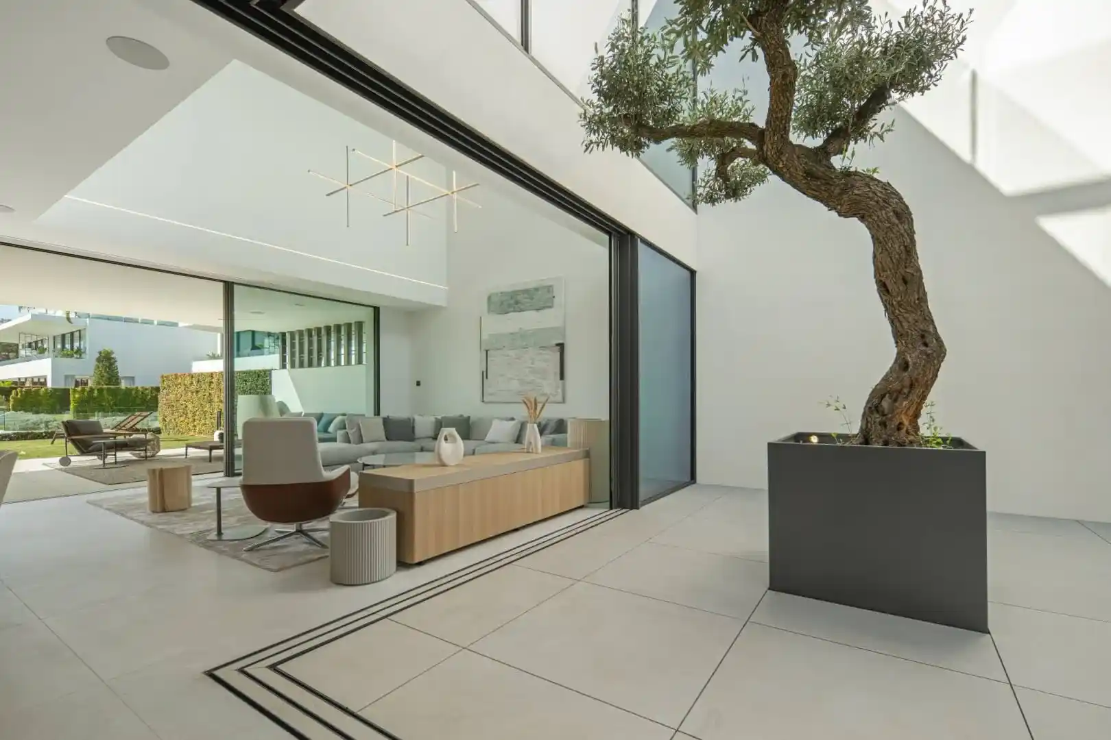 Natural light atrium in Villa 12, maximizing the feel of vibrant urbanism.