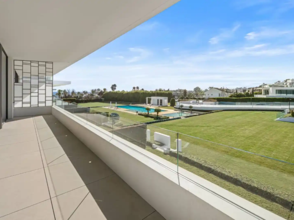 Primary bathroom in Villa 12 featuring marble finishes and bespoke cabinetry.