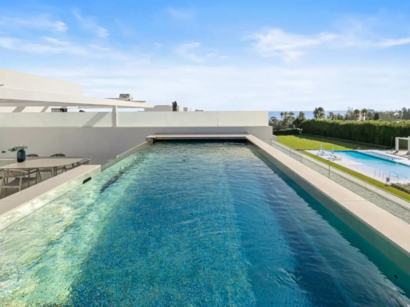 Unobstructed views from Villa 12 terrace towards the Golden Mile coastline.