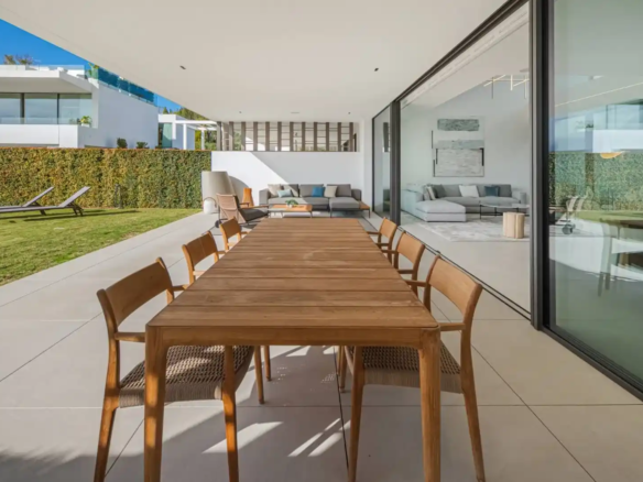 Formal dining room in Villa 12, reflecting the architecture of presence.
